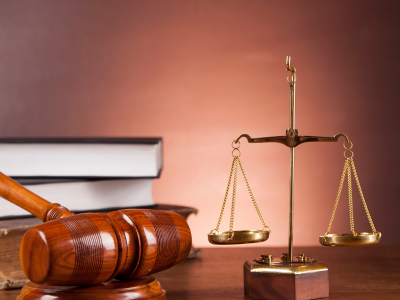 Gavel and justice scales symbolizing education law